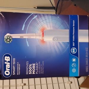 Oral-B Smart 1500 rechargeable toothbrush. Open box. Never used.